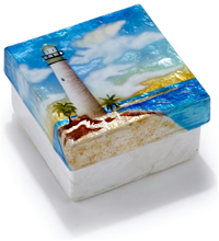 Lighthouse on tropical beach box.